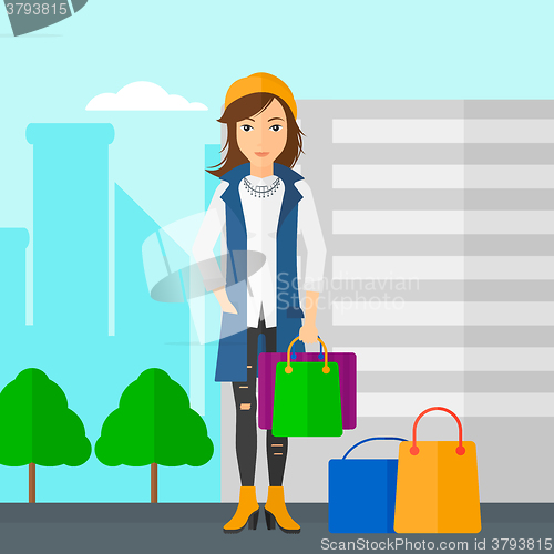 Image of Buyer with shopping bags.