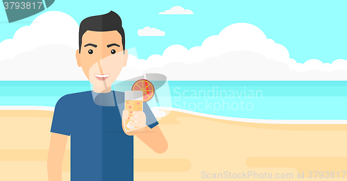 Image of Tourist with cocktail on the beach.