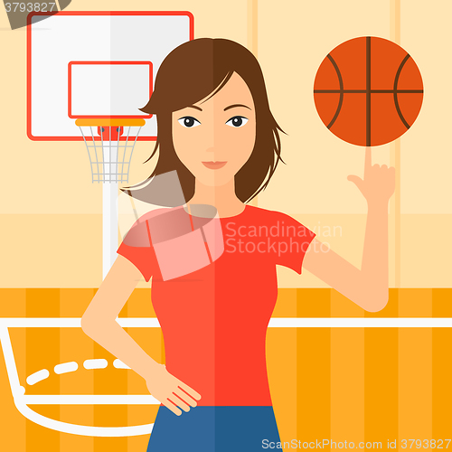 Image of Basketball player spinning ball.