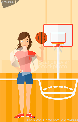 Image of Basketball player spinning ball.