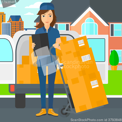 Image of Woman delivering boxes.