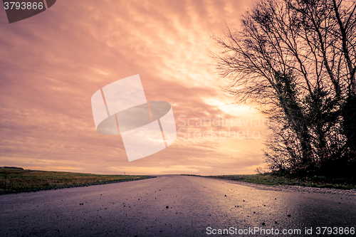 Image of Asphalt road in the sunset