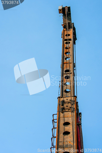 Image of Piling machine isolated on blue background