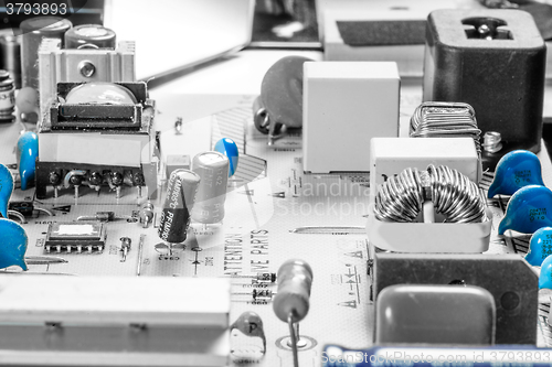 Image of Chips and capacitors on a microcircuit board