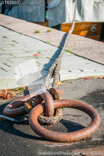 Image of Ship anchored to a post