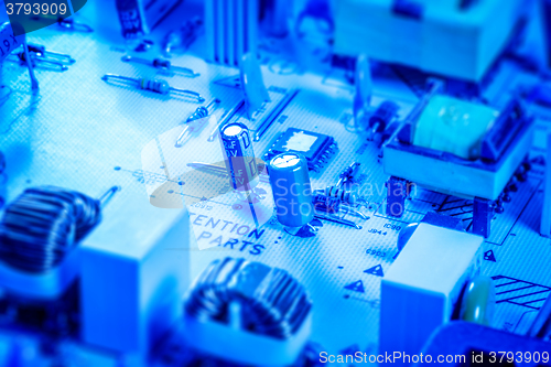 Image of Microcircuit board with capacitors and chips