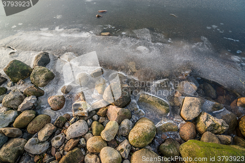 Image of Rocks at a frozen lake