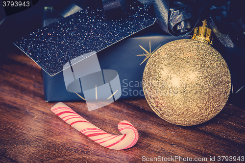 Image of Xmas presents and a sugar cane