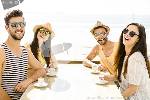 Image of Friends at the beach bar