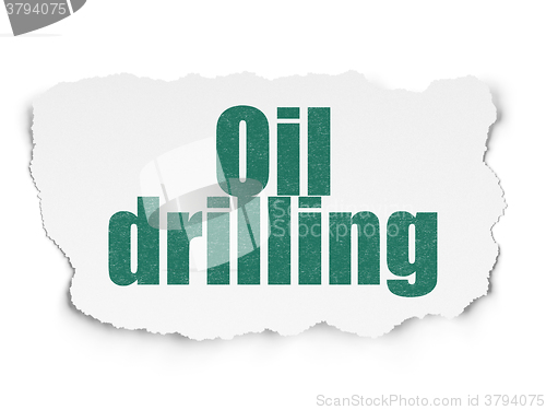 Image of Industry concept: Oil Drilling on Torn Paper background