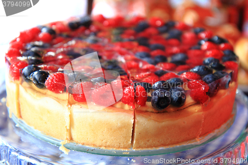 Image of raspberries and blueberries cake