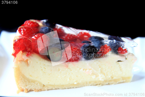 Image of raspberries and blueberries cake