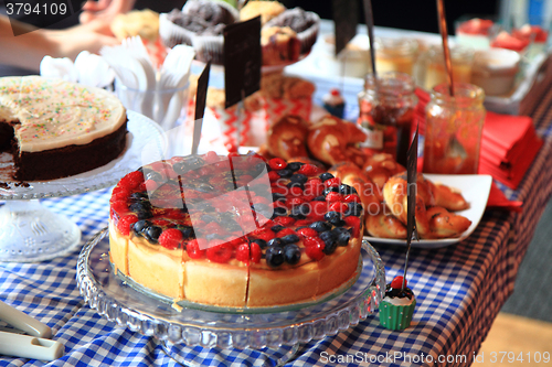 Image of raspberries and blueberries cake