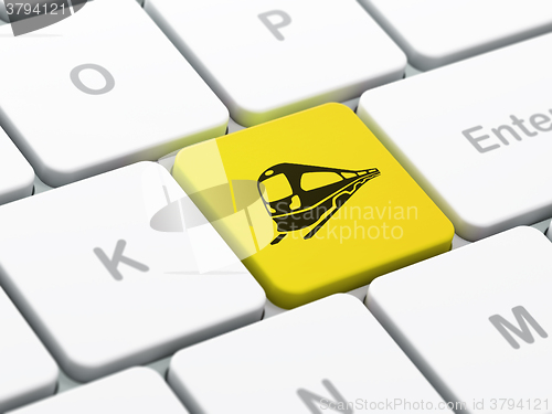 Image of Travel concept: Train on computer keyboard background