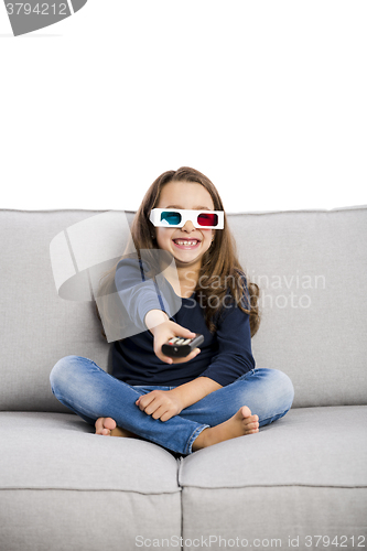 Image of Girl holding a TV remote