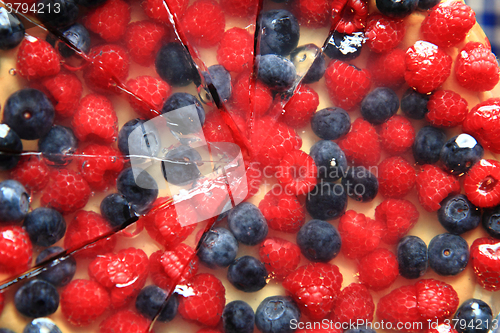 Image of raspberries and blueberries cake