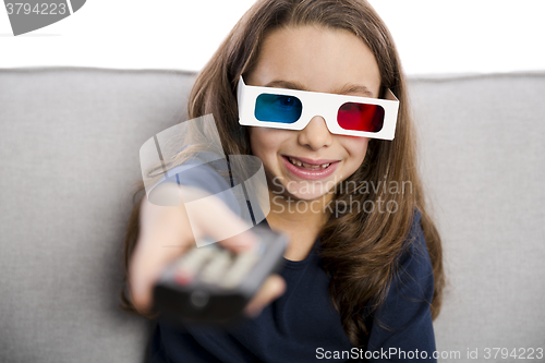 Image of Girl holding a TV remote