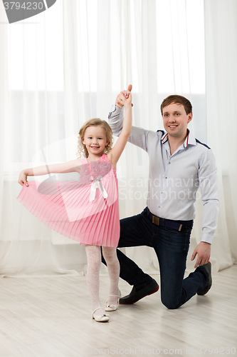 Image of Little princess dancing with father