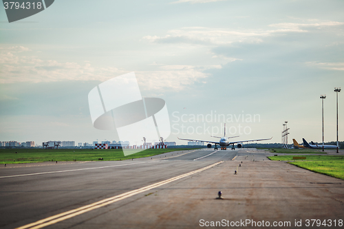 Image of Airplane taxing on the runway