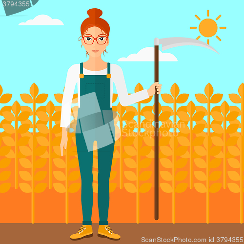 Image of Farmer on the field with scythe.