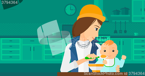 Image of Woman feeding baby.