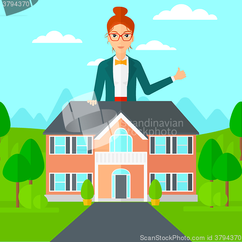 Image of Real estate agent showing thumb up.