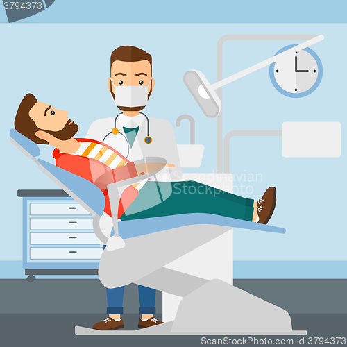 Image of Dentist and man in dentist chair.