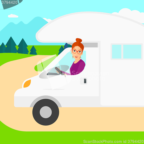 Image of Woman driving motor home.