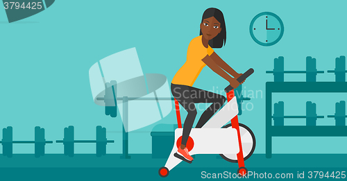 Image of Woman doing cycling exercise.