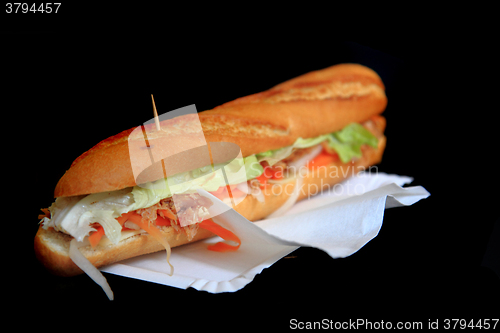 Image of baguette on the black background