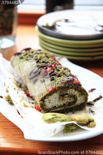 Image of pistachio roulade dessert