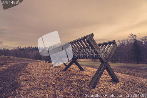 Image of Feeding stand on a field in November