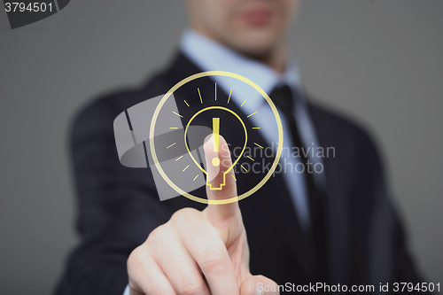 Image of businessman presses the sign idea. business and technology concept