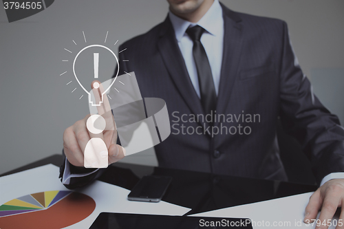 Image of businessman presses the sign idea. business and technology concept