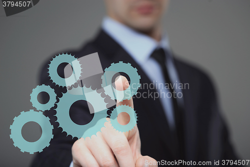 Image of Businessman Activate Gears, Touch Screen Concept