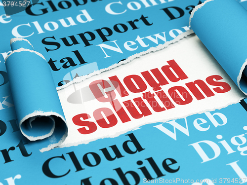 Image of Cloud networking concept: red text Cloud Solutions under the piece of  torn paper