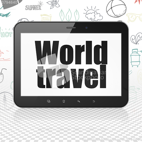 Image of Travel concept: Tablet Computer with World Travel on display