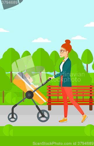 Image of Woman pushing pram.