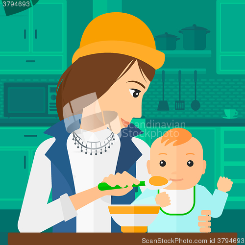 Image of Woman feeding baby.