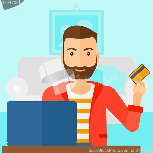 Image of Man making purchases online.