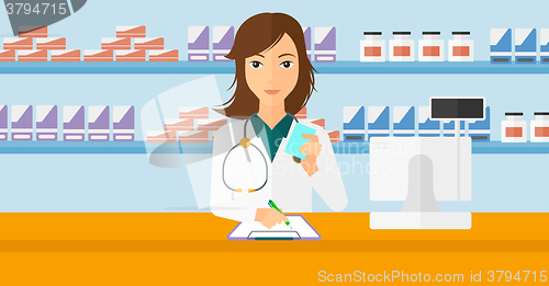 Image of Pharmacist taking notes.