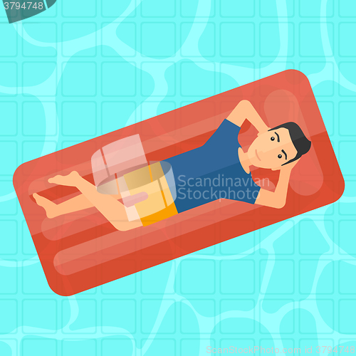 Image of Man relaxing in swimming pool.