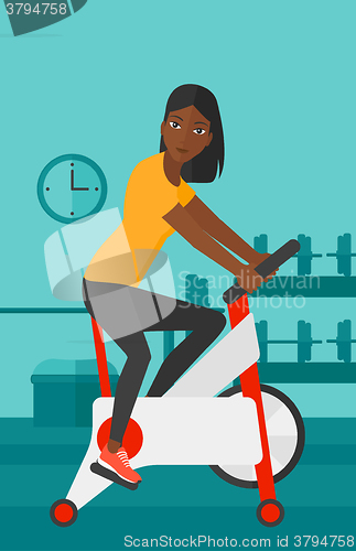 Image of Woman doing cycling exercise.