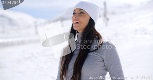 Image of Gorgeous young woman in a snowy landscape