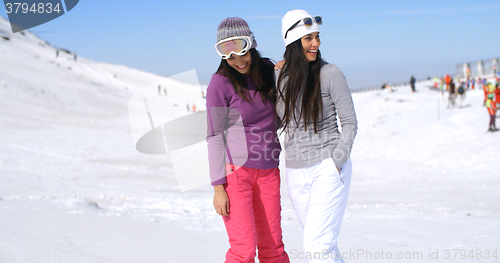 Image of Two attractive women friends at a ski resort