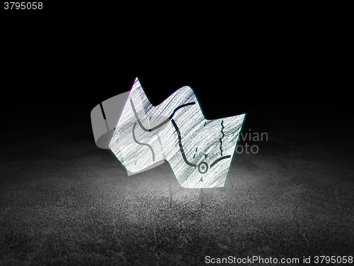 Image of Vacation concept: Map in grunge dark room