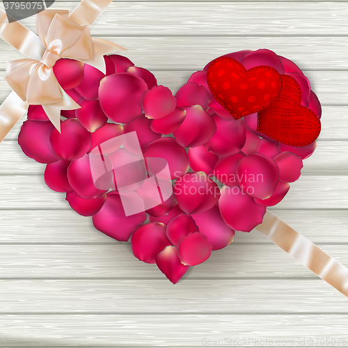 Image of Roses petals on wooden background. EPS 10
