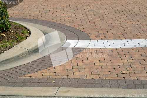 Image of curved driveway with painted line