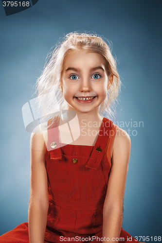 Image of Beautiful portrait of a happy little girl smiling