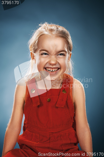 Image of Beautiful portrait of a happy little girl smiling
